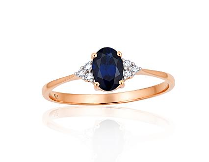 Ring aus Rotgold mit Diamanten und Saphir