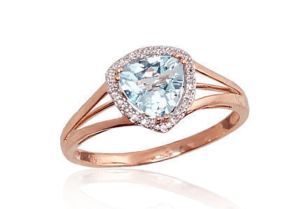 Ring aus Rotgold mit Diamanten und himmelblauen Topasen