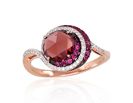Red gold ring with diamonds, rubies and a garnet