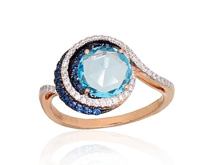 Red gold ring with diamonds, sapphires and blue topazes