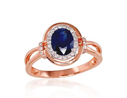 Gold ring with diamonds and a sapphire