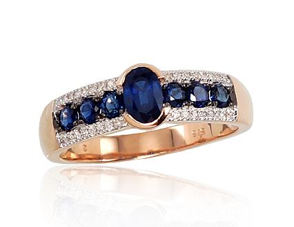 Red gold ring with diamonds and sapphires
