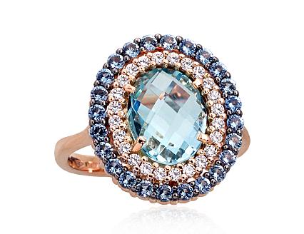 Ring aus Rotgold mit Zirkonia und himmelblauen Topasen