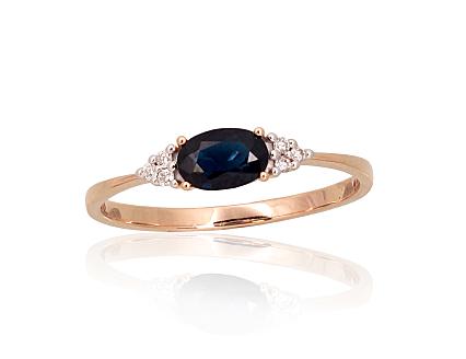 Ring aus Rotgold mit Diamanten und Saphir