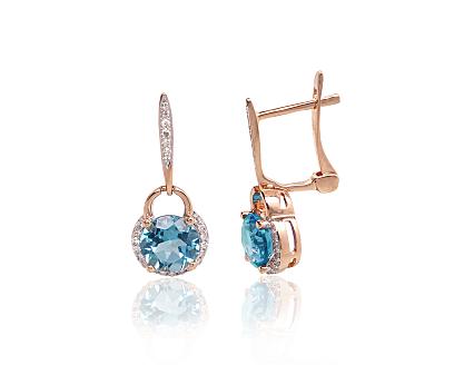 Red gold earrings with diamonds and blue topazes