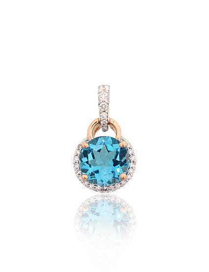 Red gold pendant with diamonds and a blue topaz