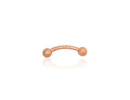Punasest kullast piercing